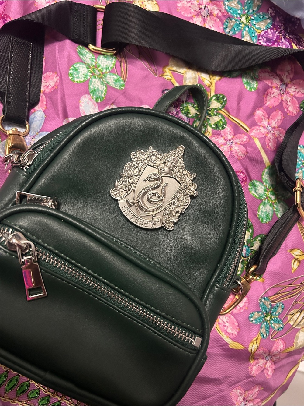 Dark Green Mini Backpack Crossbody with Silver Crest Emblem